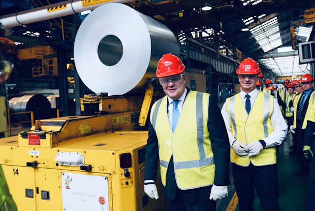 Scott Morrison and Angus Taylor at a steel factory