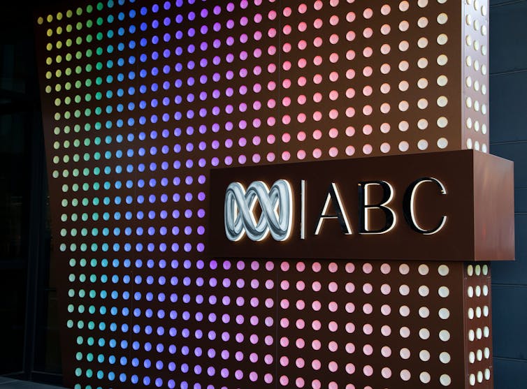 ABC logo against colourful light backdrop