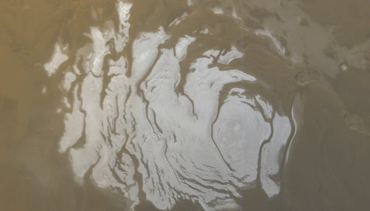 The white ice cap at the south pole of Mars, seen from space.