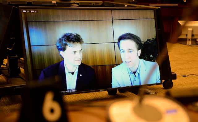 WE Charity's Marc Kielburger, left, and Craig Kielburger, right, appear as witnesses via videoconference