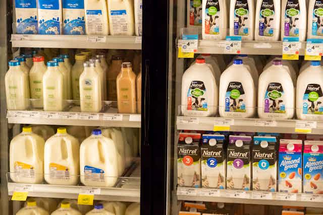Refrigerated milk aisle at a supermarket