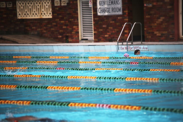 People swim at a pool in Sydney.