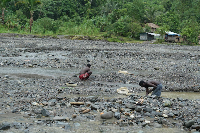 Two people in mine waste