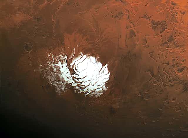 A satellite view of the South Pole of Mars, showing the ice cap.