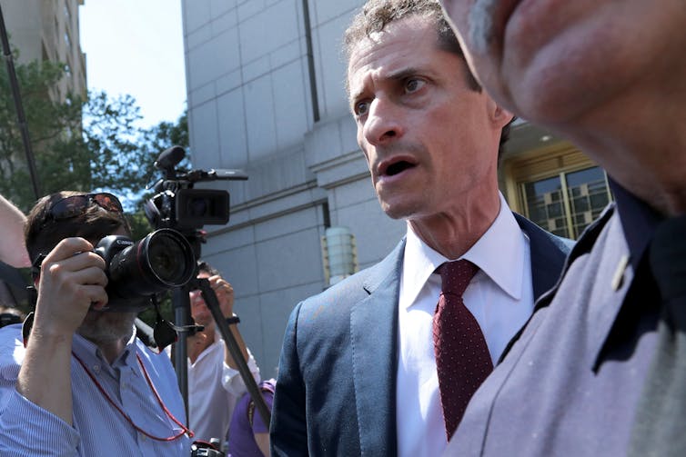 Anthony Weiner leaves court on May 19 201.