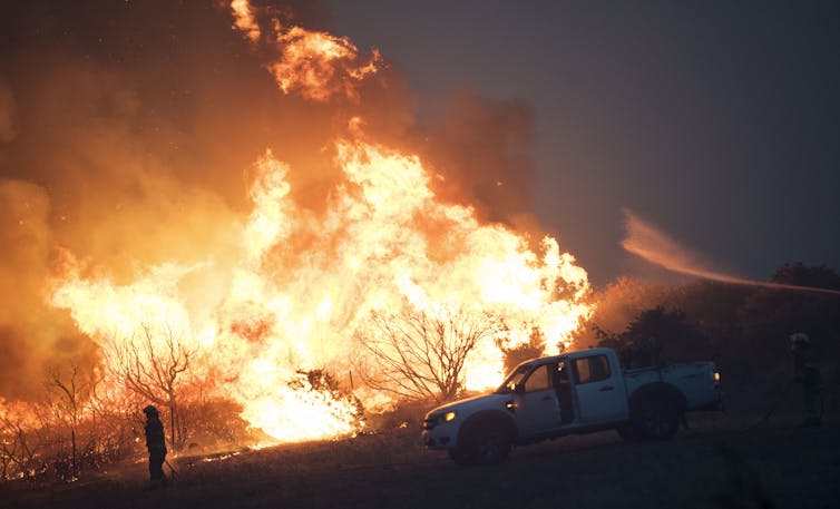 Firefighter battles bushfire