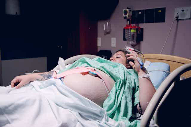 A woman in hospital during childbirth.