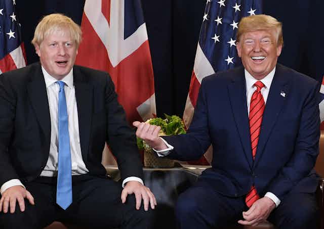 Donald Trump laughing at Prime Minister Boris Johnson.