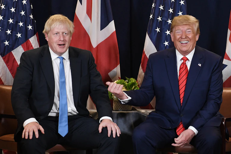 Donald Trump laughing at Prime Minister Boris Johnson.