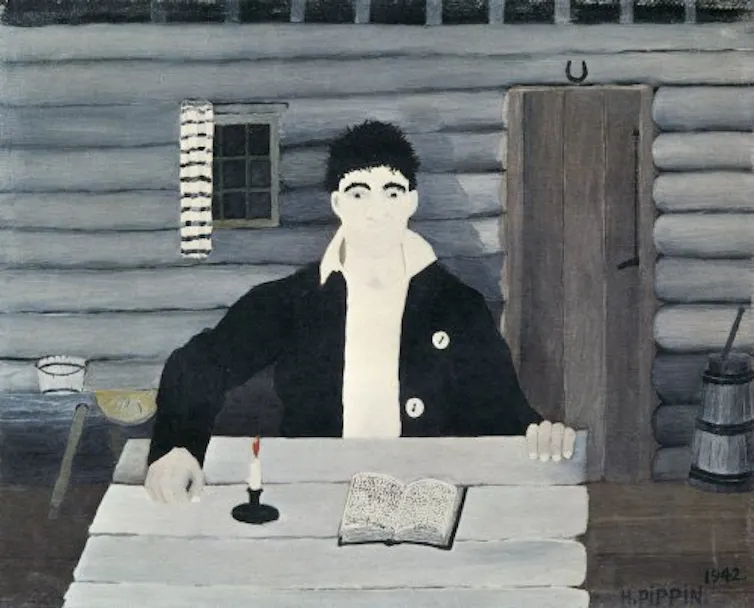 A young John Brown, freshly shaven, sits at a table in front of an open Bible.