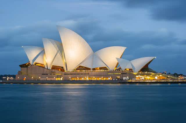 Photo of the Sydney Opera House against a stormy sky