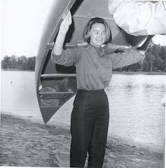 Lynda Bird Johnson portaging a canoe
