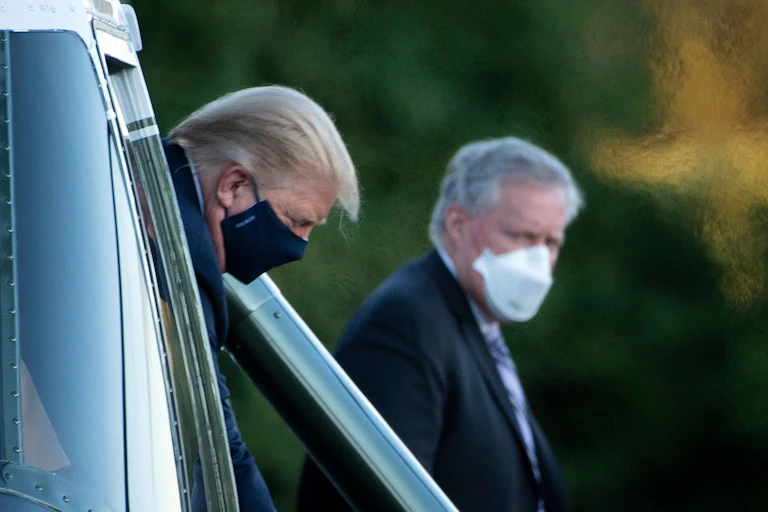 Trump getting off Marine One at Walter Reed Medical Center.