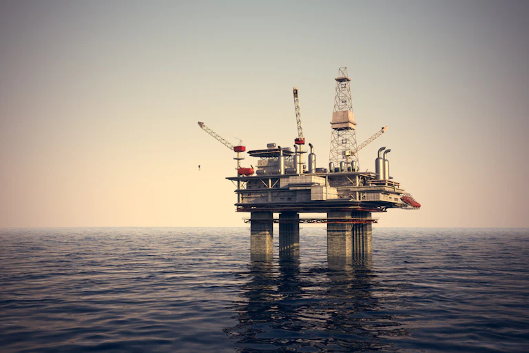 Faded image of oil rig in ocean