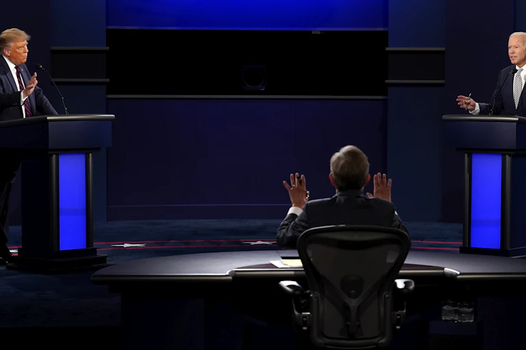 Moderator Chris Wallace, President Trump and Joe Biden speak over each other during the first presidential debate