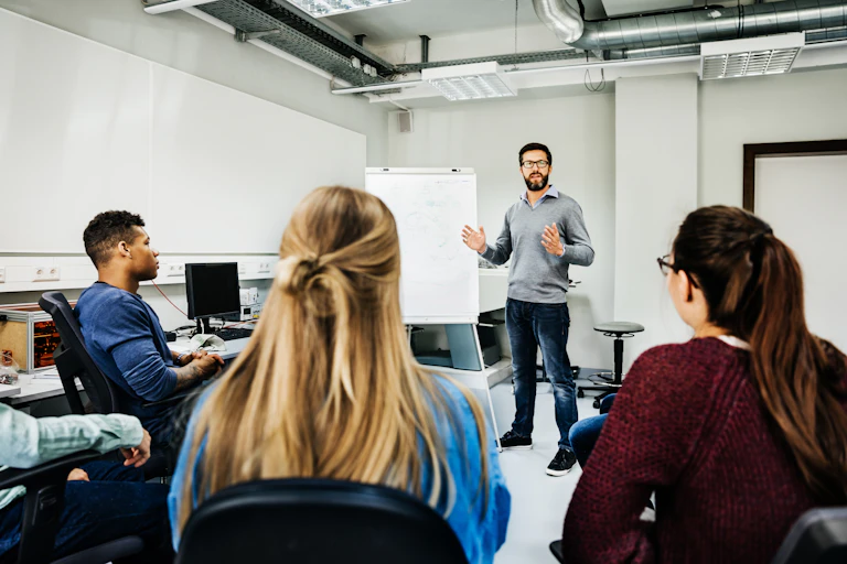A speaker in a college classroom.