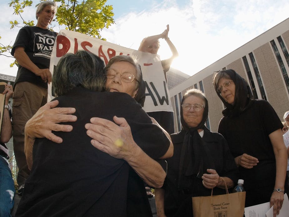 Sister Ardeth Platte being hugged by a supporter ahead of being sentenced on 2003.