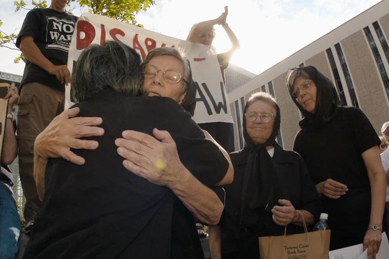 Sister Ardeth Platte being hugged by a supporter ahead of being sentenced on 2003.
