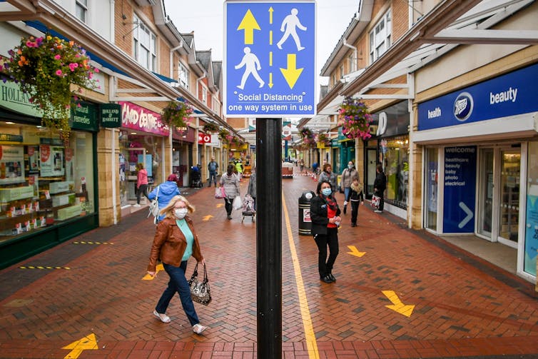 A one-way system operates on a high street.