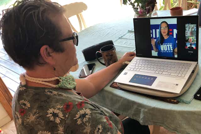 A woman participates in a video conference