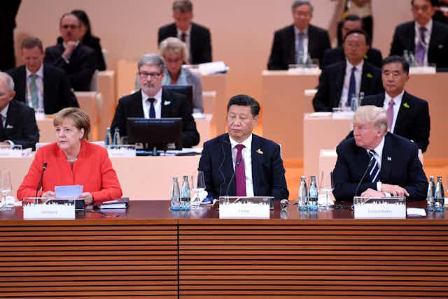 Angela Merkel, Xi Jinping and Donald Trump
