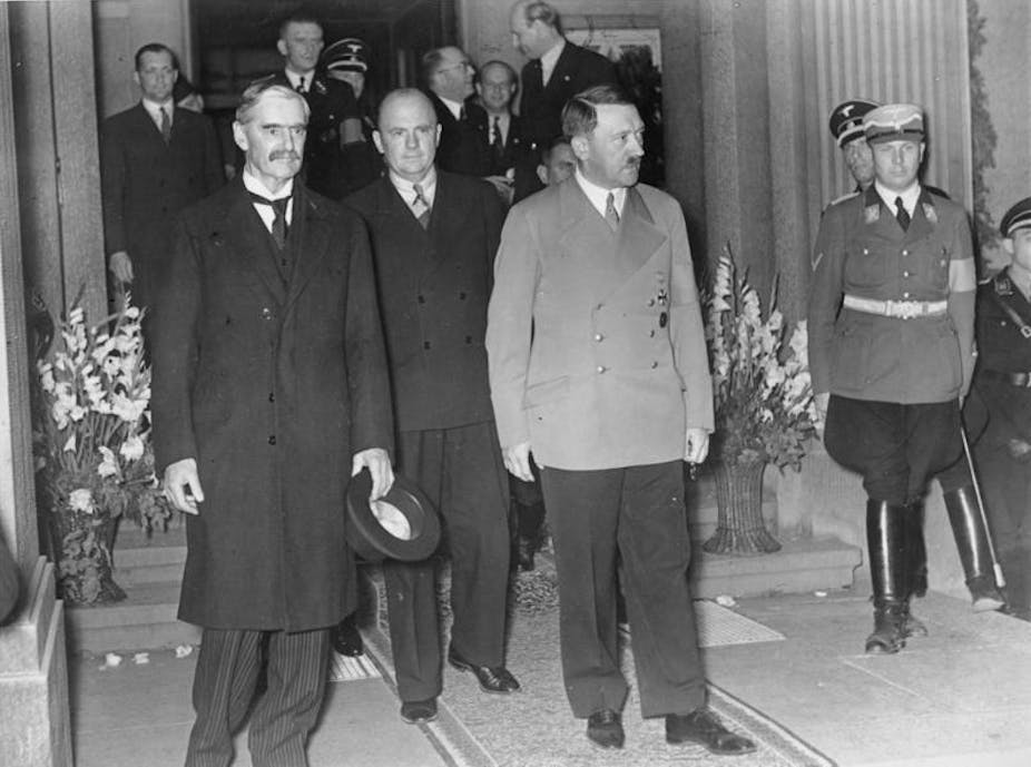 Neville Chamberlain and Adolf Hitler accompanied by various aides in Bad Godesberg in 1938.