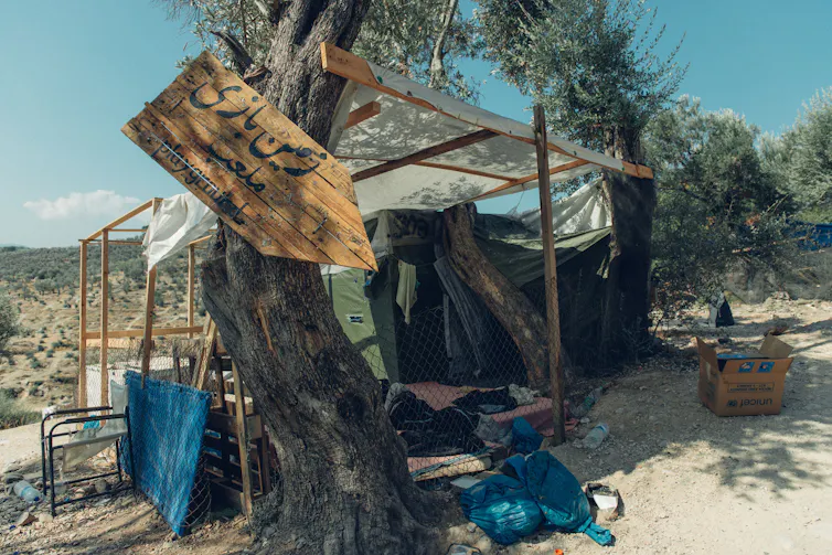 The burned remains of a shelter in Moria camp, Lesbos