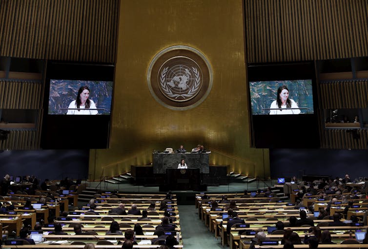 Delegates seated within United Nations general assembly