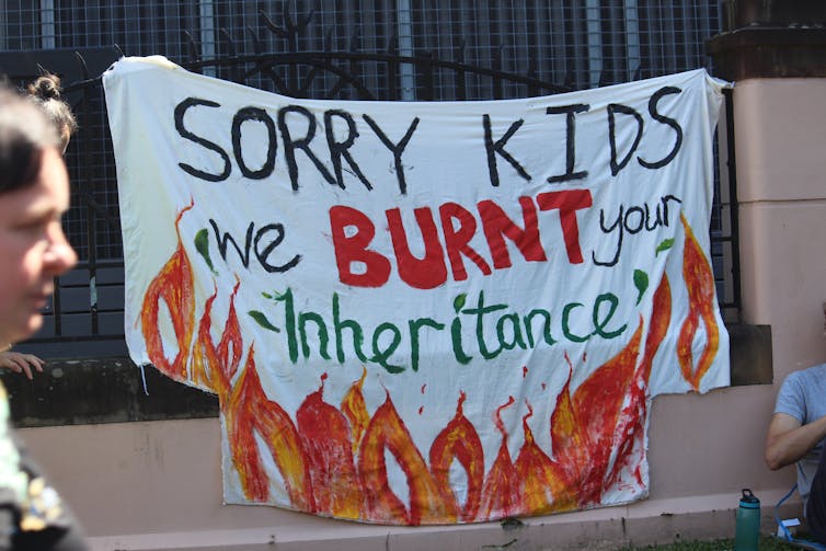 A banner reads: Sorry kids, we burned your inheritance