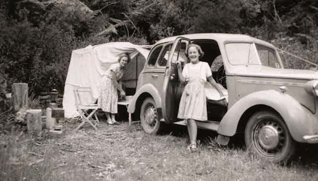 Mother and daughter at family campsite in 1950s