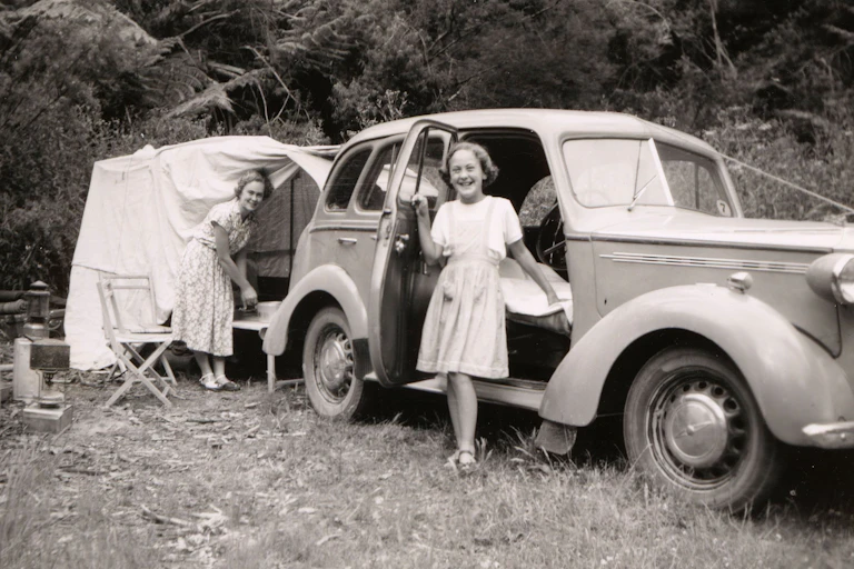 Mother and daughter at family campsite in 1950s
