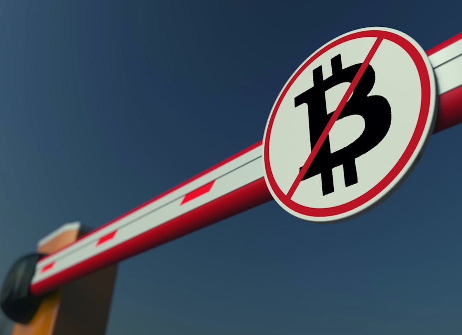 Rail traffic halt sign with a bitcoin logo