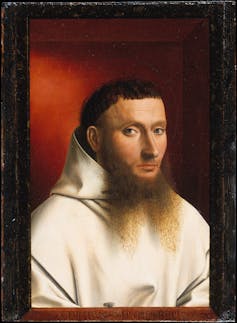 Painting of a bearded monk with a fly painted on the frame.