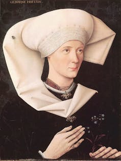 Renaissance Portrait of a woman with a fly on her head.