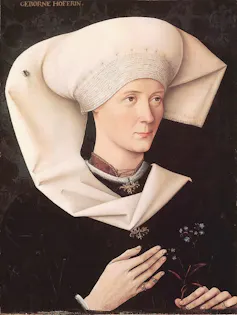 Renaissance Portrait of a woman with a fly on her head.