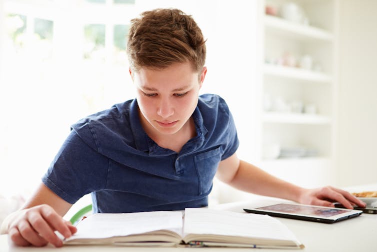 Teenage boy studying