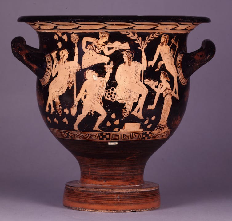 Pottery: Red statue Belcrater: Dionysus, Satyr, Manado