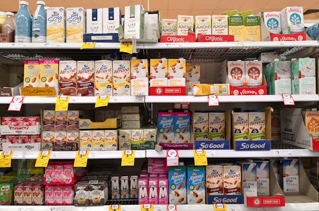 Varieties of longlife milk on a shelf 