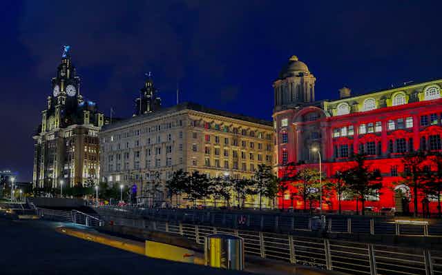 The Liverpool docks lit up at night.