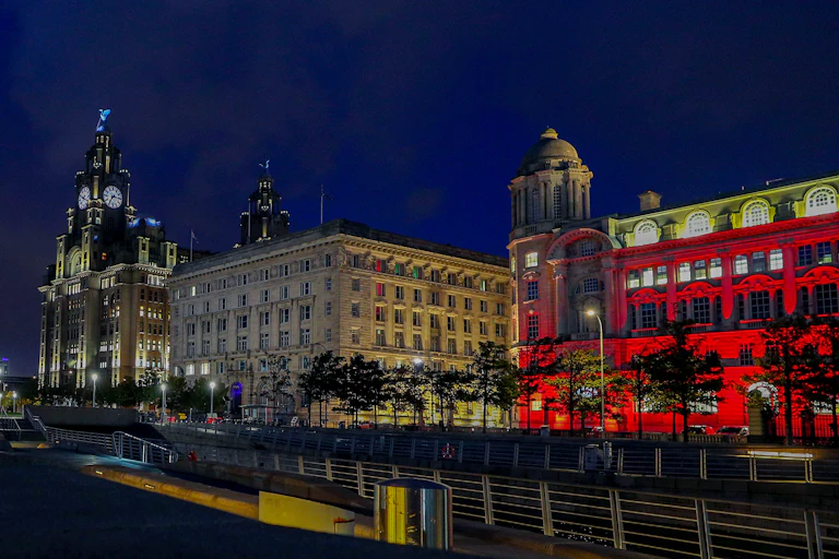 The Liverpool docks lit up at night.