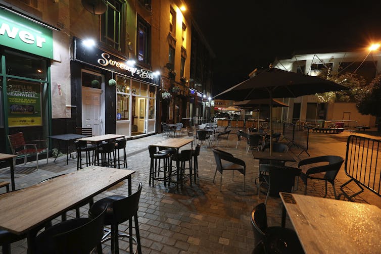 Empty chairs and tables in Liverpool, England