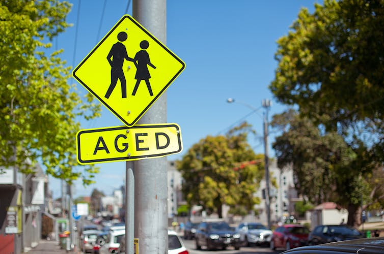 A street sign saying 'AGED'.