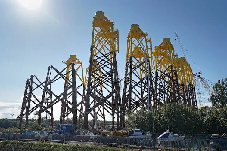 Black and yellow industrial structures.