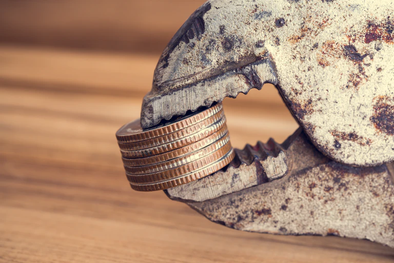 Coins in a wrench