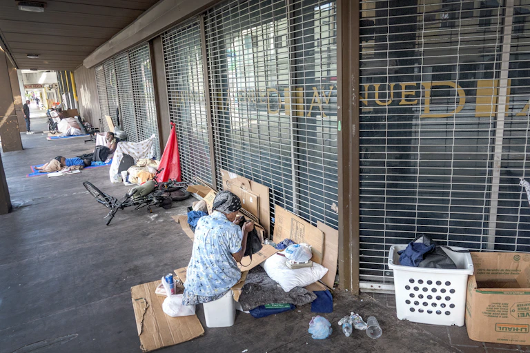 People sleeping rough outside shops
