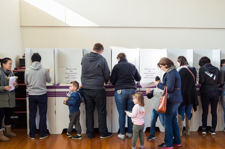 Australians voting at a polling booth.