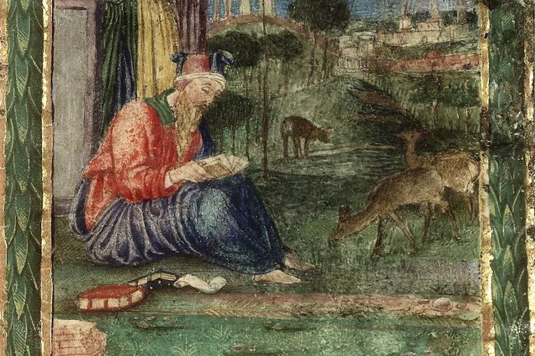 Hippocrates sitting down reading