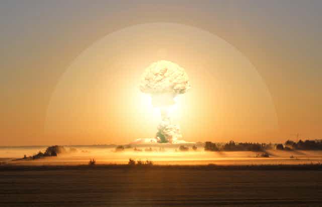 Illustration of a nuclear bomb explosion, lighting up the atmosphere