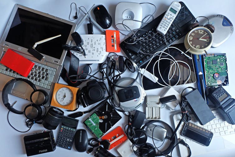 Unused electronic devices in a pile.
