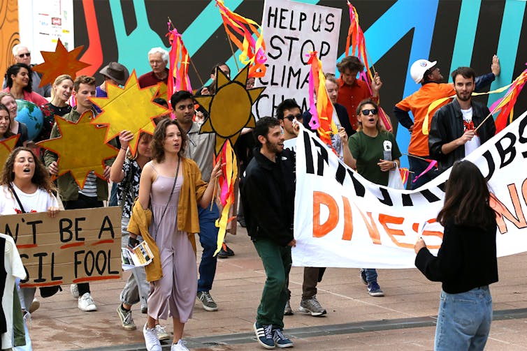 University students march to demand action on climate change